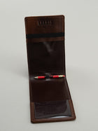 Brown leather yardage book interior with pencil holder