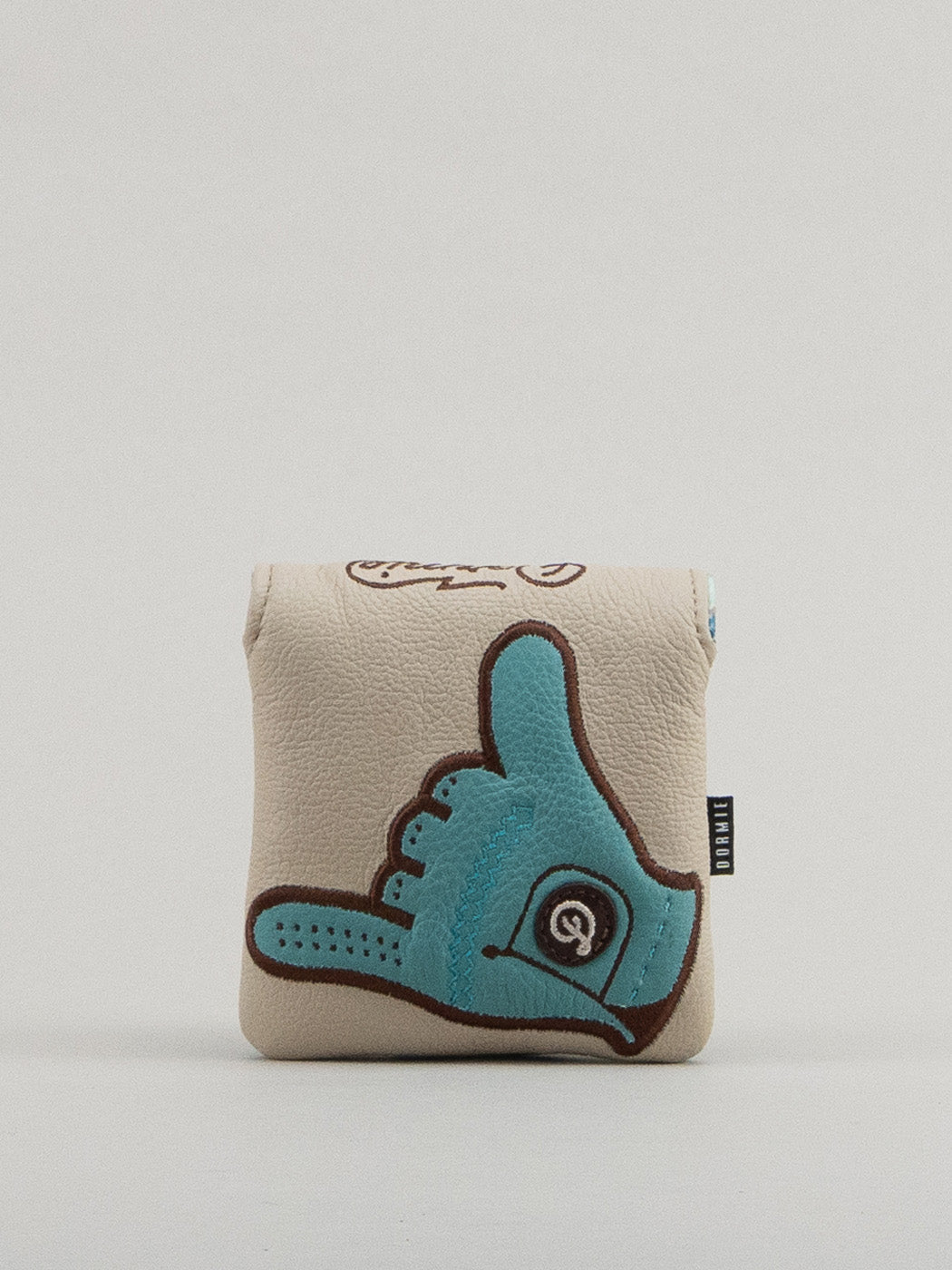 Creme leather headcover with embroidered and applique shaka glove