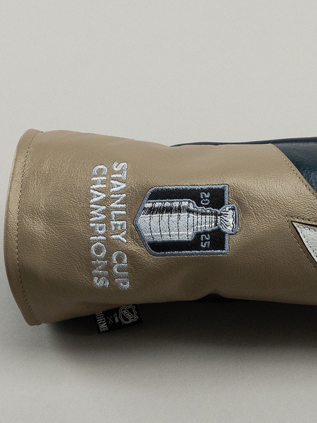 Close up of stanley cup logo on golf club headcover